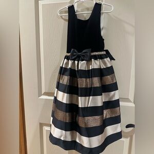 Elegant Black and Gold Striped Dress with Bow